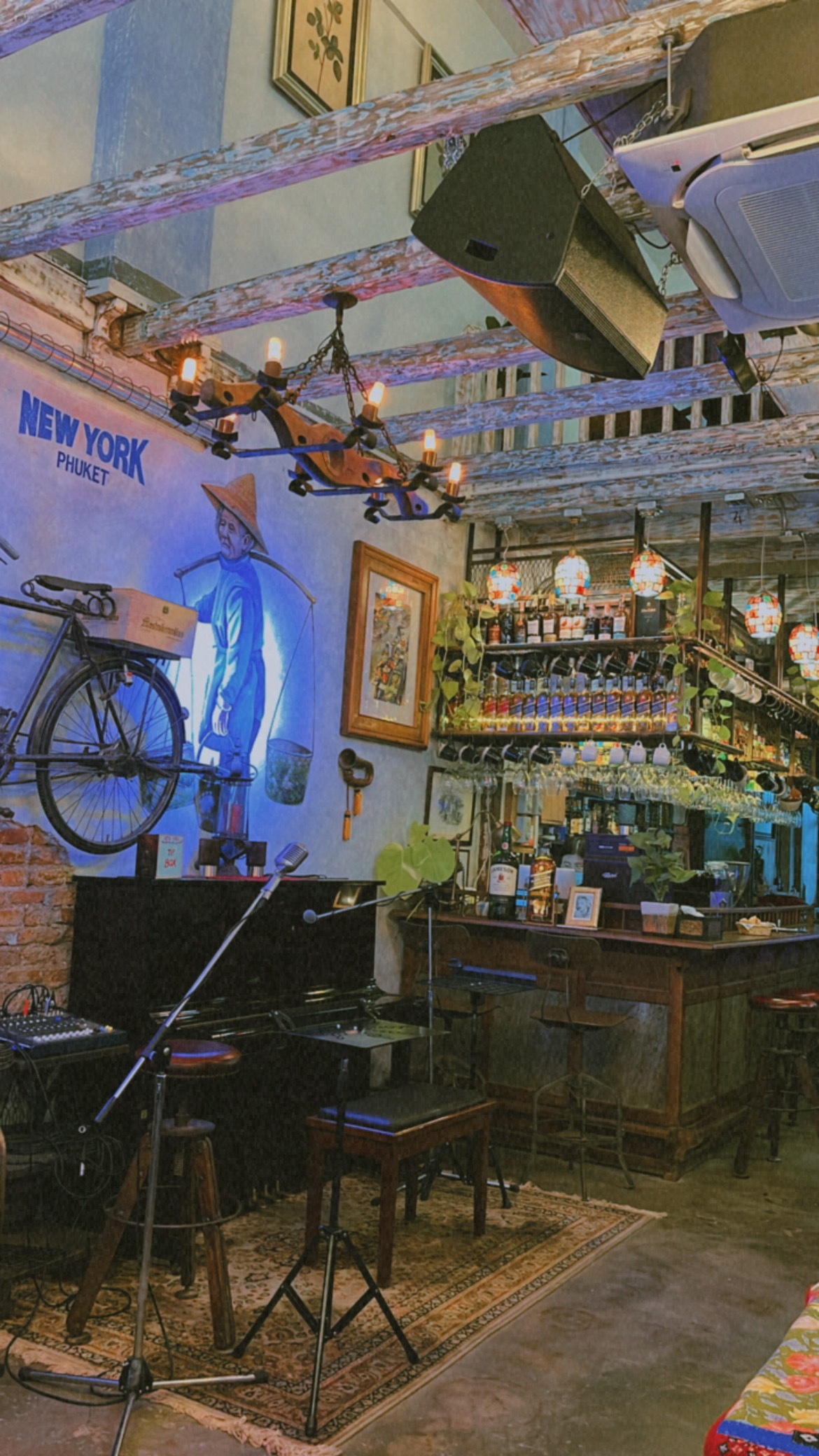 Bar area with mural and live music